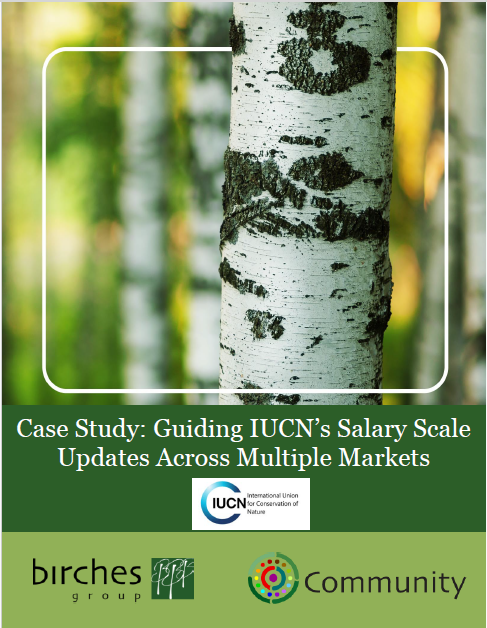 Close-up of birch tree trunks with a white rectangular overlay and text about an IUCN salary scale case study, featuring Birches Group and Community logos at the bottom.